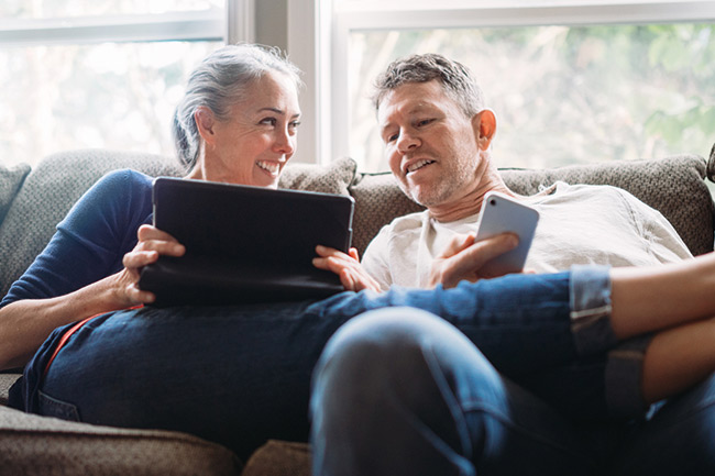 happy couple creating a will on LawAssure with Foresters