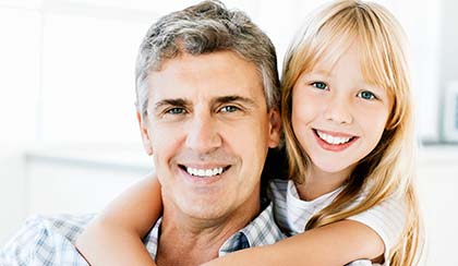 Happy man and child posing 