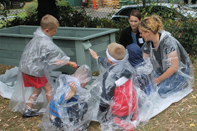 UK members helping at an event to refurbish a school