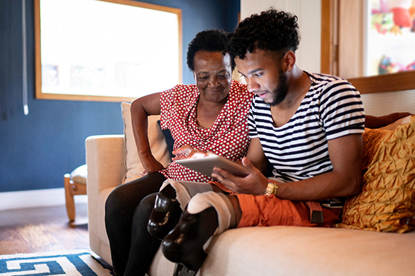 happy black mother and son opening a foresters isa