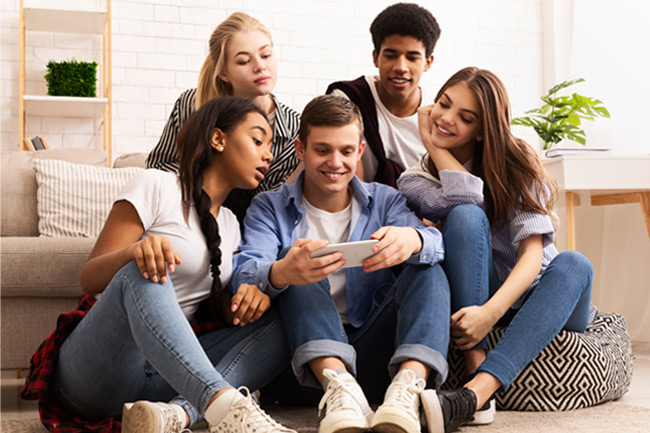 Group of teenagers looking for the funds their CTFs invest in