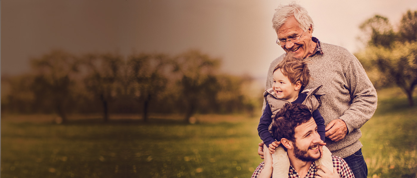 Happy family in the park who contributed to a child's Foresters Plan