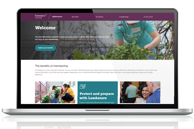 Father and daughter sitting on a grey sofa using an iPad to activate their online Child Trust Fund account