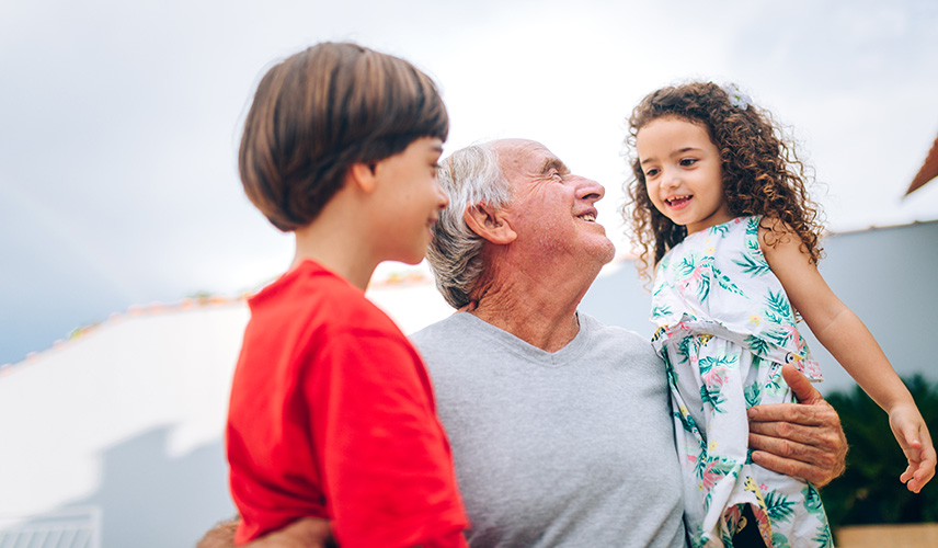 Grandfather playing with grandkids